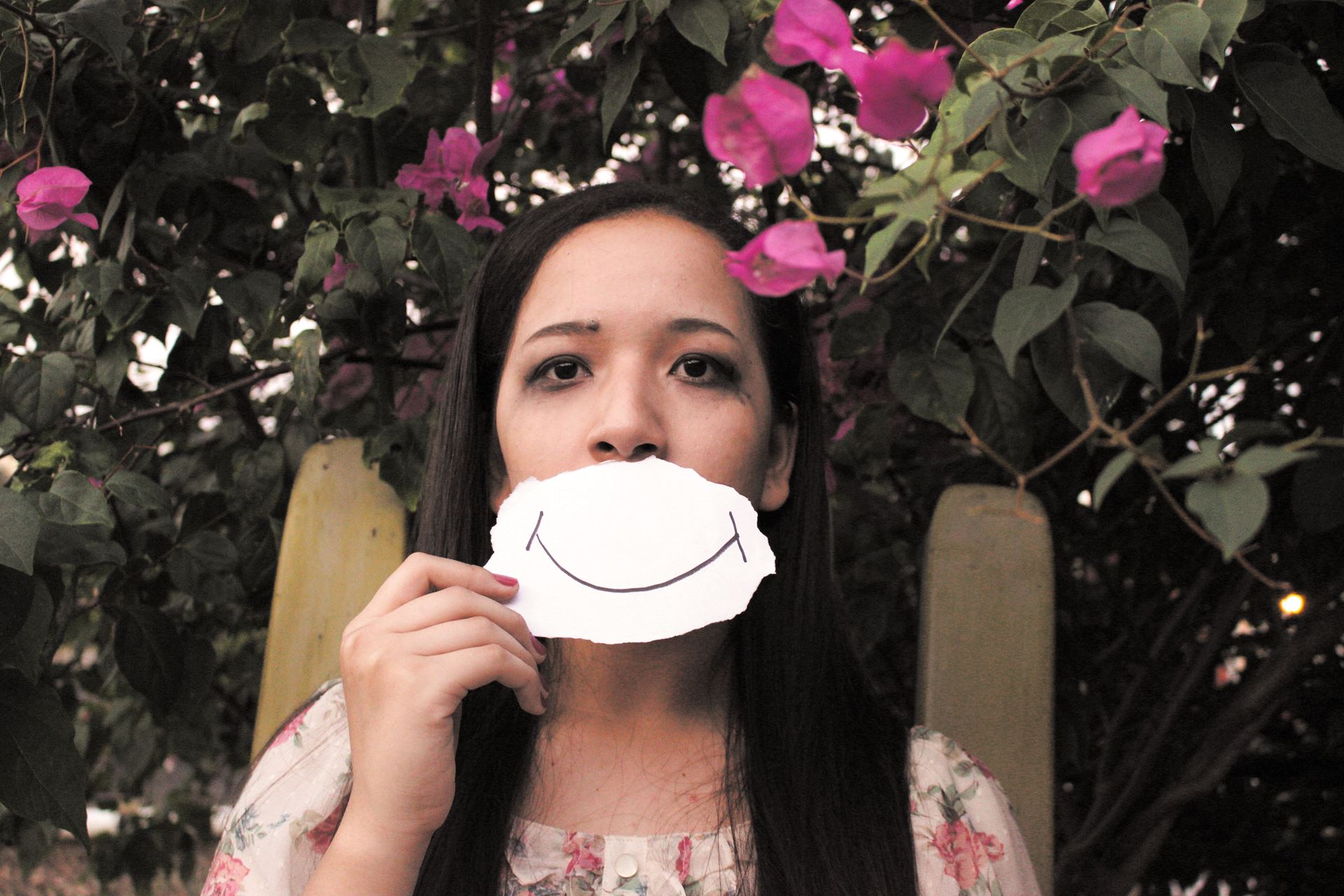 a woman eating a donut